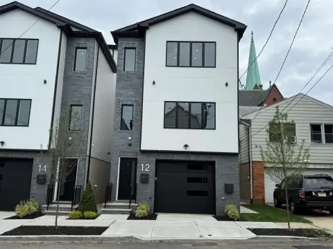 Two-Family Residence with Roofdeck