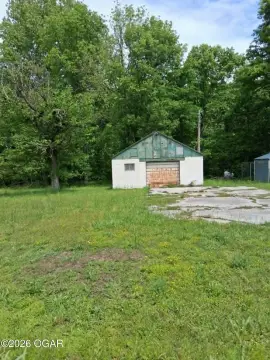 Acre of Land with Garage