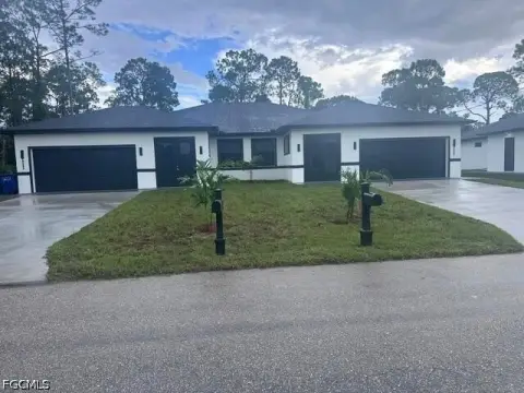 Three-Bedroom Duplex with Garages