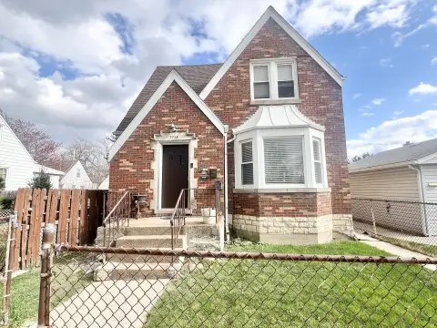 Brick Triplex with Coach House