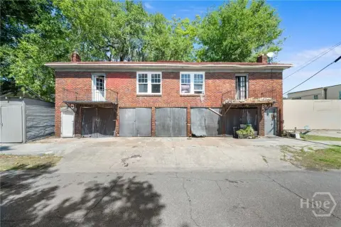 Brick Duplex with Garage Bays