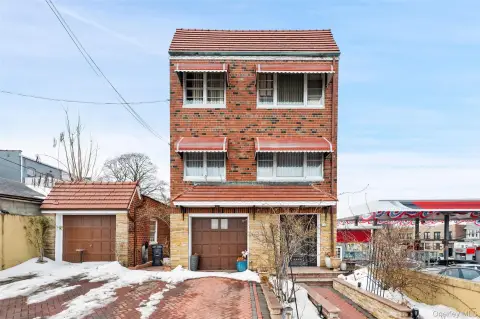Brick Triplex With Solar Panels