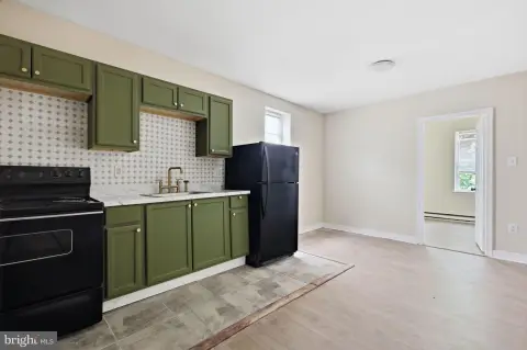 Renovated Triplex with Rear Yard