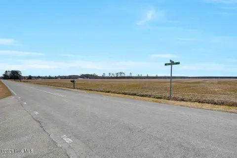 Residential Corner Acreage with Water