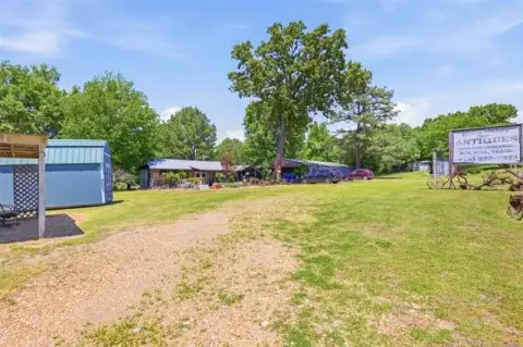 Highway Commercial Property with Outbuildings