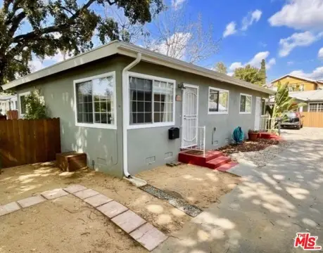 Well-Maintained Triplex with Three-Car Garage