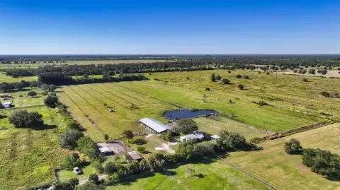 Fenced Ranch Acreage with Cottage