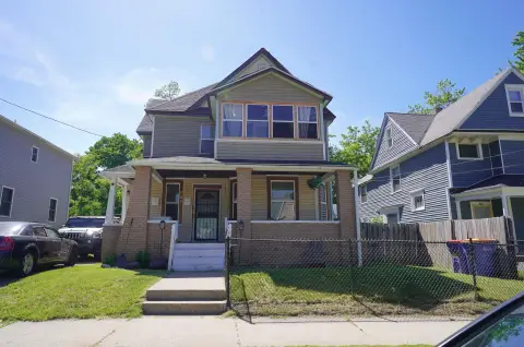 1900s Duplex with Enclosed Porches