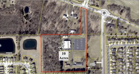 Development Land with Existing Buildings