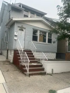 Two-Family Home with Off-Street Parking