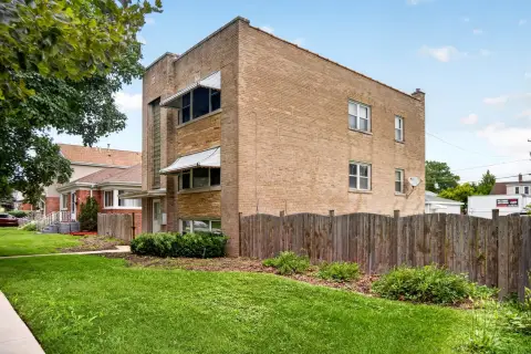 Brick Duplex With Garage