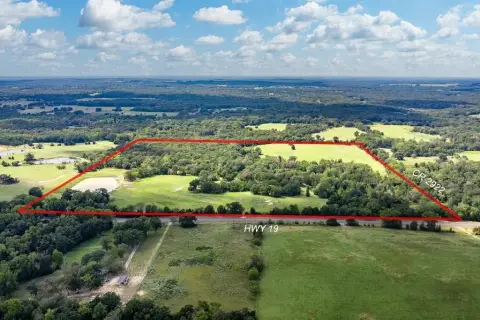 Highway Frontage Acreage with Development Potential