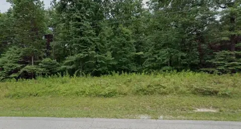 Wooded Corner Homesite with Dual Frontage