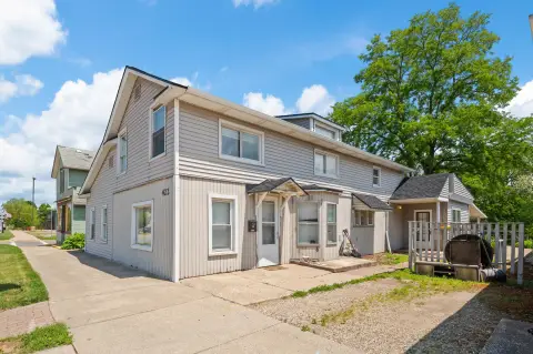 Updated Two-Unit Duplex with Bay Windows