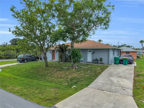 Remodeled Duplex with Screened Lanais