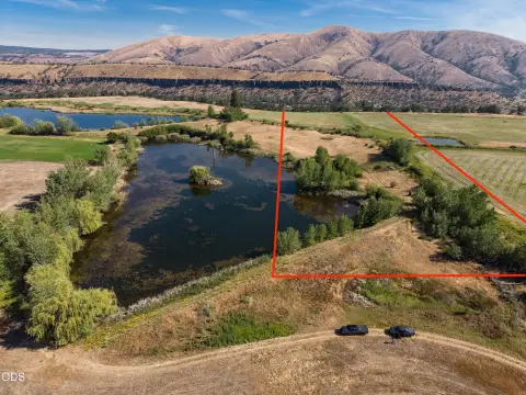 Buildable Ranch Lot with Pond Frontage