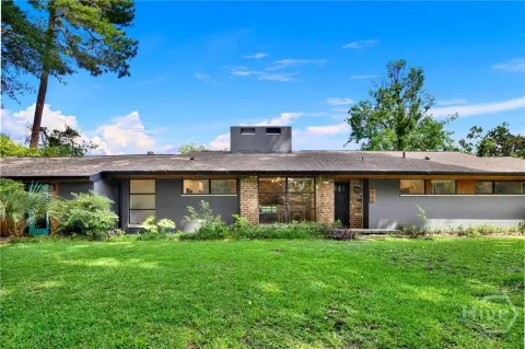 Updated Multifamily Duplex with Private Suite