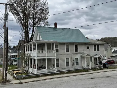 Duplex with Coin-Operated Laundry