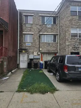 Built 2004 Three-Family Brick