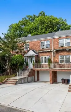 Newly Renovated Two-Family Brick Townhouse