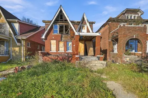Brick Duplex Requiring Renovation
