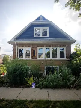Brick Duplex with Two-Car Garage