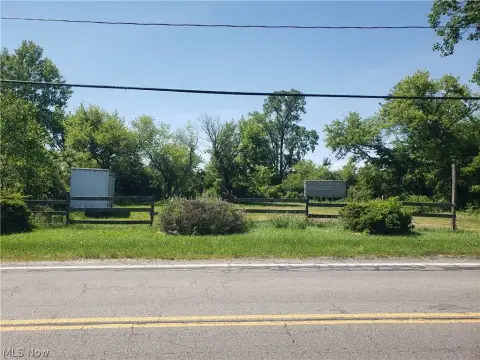 Fenced Commercial Buildable Lot