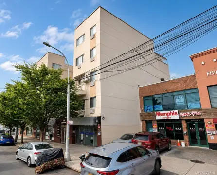Mixed-Use Quadplex with Ground-Floor Retail