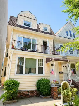 Two-Family Home with Driveway Parking