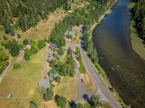 Riverfront Resort with Log Cabins