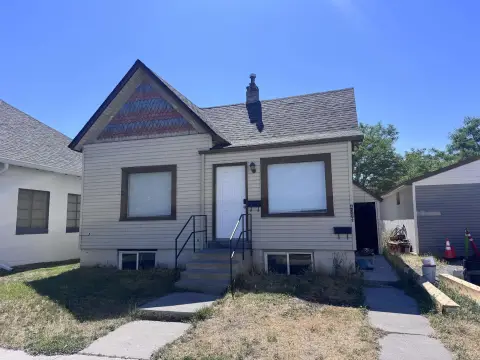 Triplex with Rented Commercial Garage