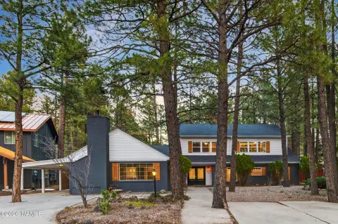 Duplex with Private Upper-Level Suite