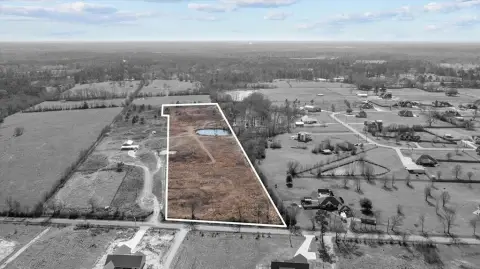 Unrestricted Land with Stocked Pond