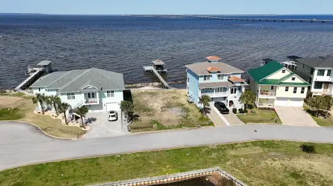 Improved Waterfront Home Site