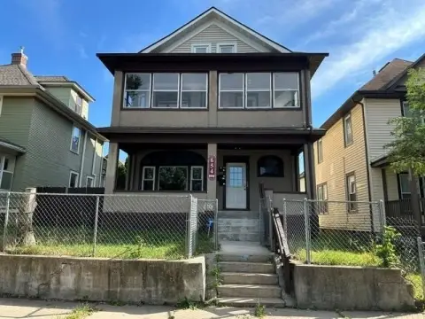 Licensed Triplex with 3-Car Garage