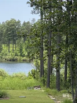 Lake-Front Building Lot in Gated Golf Community