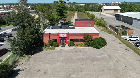 Automotive Property with Fenced Yard