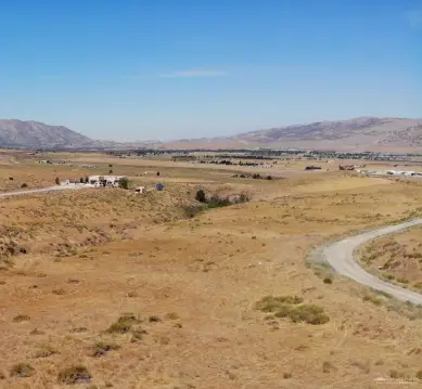 Land with City and Mountain Views