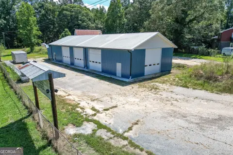 Fenced Auto Shop Property