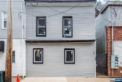 Two-Unit Duplex with Updated Interiors