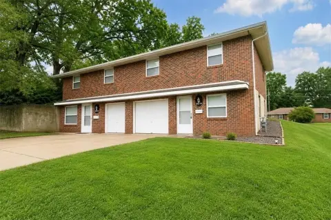Brick Duplex With Private Garages
