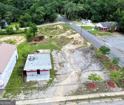 Corner Commercial Land with Existing Building
