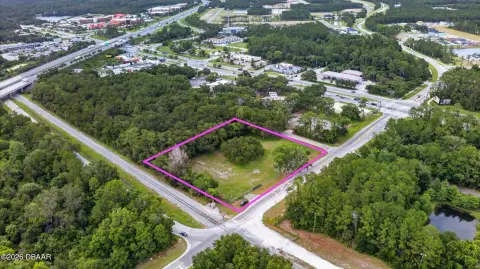 Cleared Fenced Commercial Land Parcel