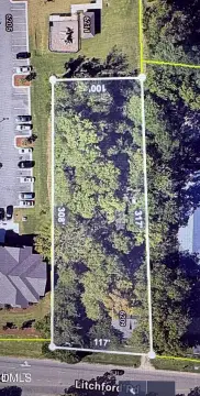 Zoned Commercial Land with Existing Home
