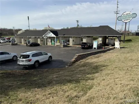 Self-Service Car Wash at Highway Corner