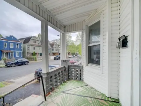 Three-Family Home with Private Backyard