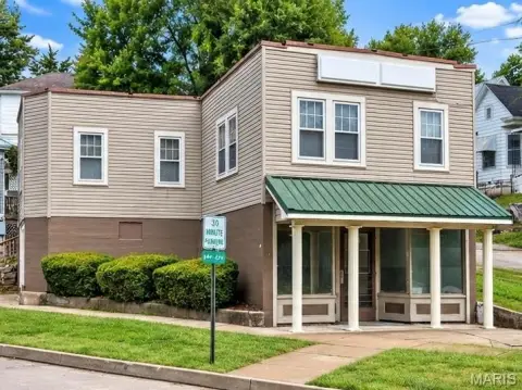 Mixed-Use Building with Apartment