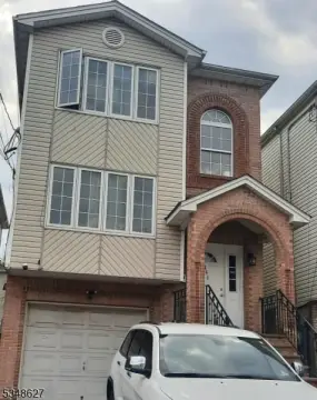 Two-Family Duplex with Solar Panels