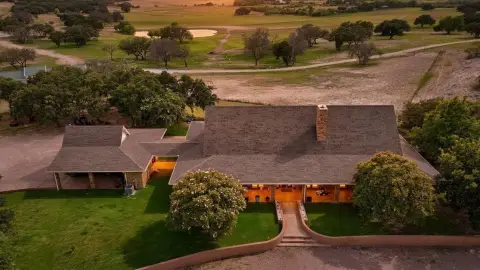 Hilltop Ranch with Custom Stone Home