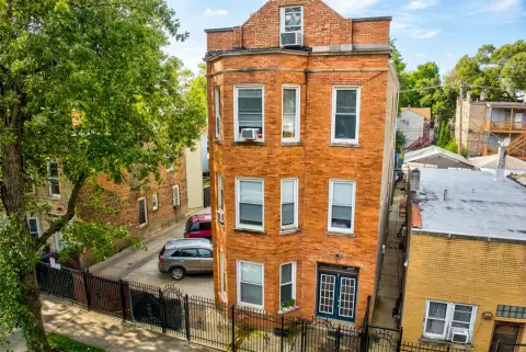 Brick Triplex with Garages